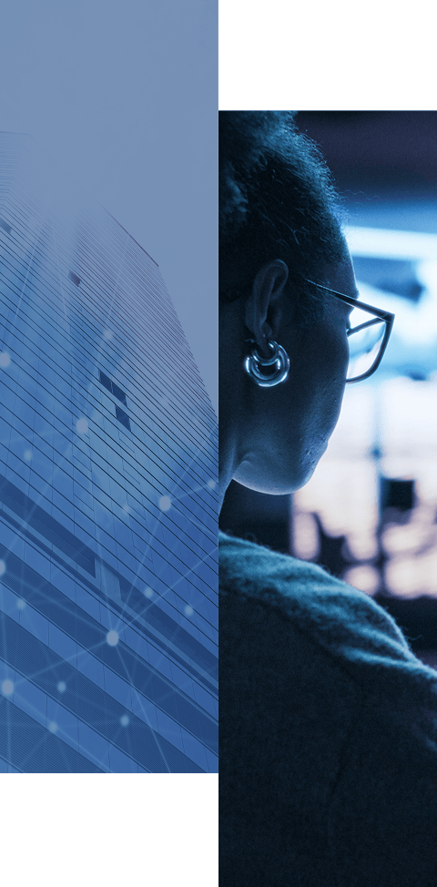 Split image: on the left, a tall modern glass building viewed from below; on the right, a person with glasses and hoop earrings looks at a computer screen in a dimly lit room, blue tones throughout.
