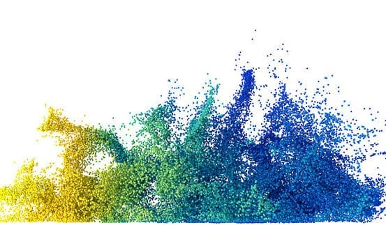 Colorful particles in yellow, green, and blue splash upward against a white background, creating an abstract, vibrant effect reminiscent of the dynamic layers found in Zero Trust Architecture.